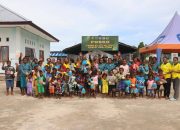 Anak dan Ibu Hamil di Kampung Rembai Diberikan Makanan Tambahan dari Satgas TMMD Ke-127 Kodim 1709/Yawa