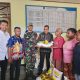 Bupati Benyamin Arisoi Serahkan Langsung Bantuan Pangan kepada 676 KK di Anotaurei